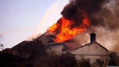 California Wildfires Damage Homes, Force Thousands To Evacuate Amid Strong Winds