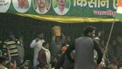 Farmers bring water for Rakesh Tikait from Muzaffarnagar