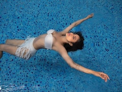 PICS: Mouni Roy Turns Up The Heat As She Takes A Dip In Pool; Surbhi Jyoti & Others Drop Hearts