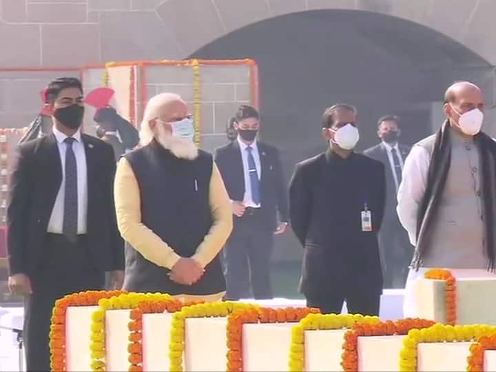 Prime Minister Narendra Modi and Union Defence Minister Rajnath Singh at Raj Ghat in Delhi on the occasion of Mahatma Gandhi's death anniversary. (ANI Photo)