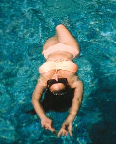 PHOTOS: Check Out Sunny Leone Chilling In Swimming Pool In A Peach Bikini