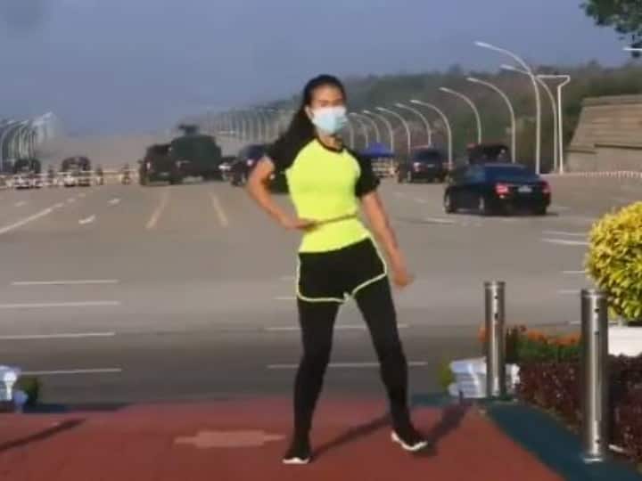 WATCH | Aerobics Instructor From Myanmar Continues Her Workout Routine As Coup Unfolds Behind Her WATCH | Aerobics Instructor From Myanmar Continues Her Workout Routine As Coup Unfolds Behind Her