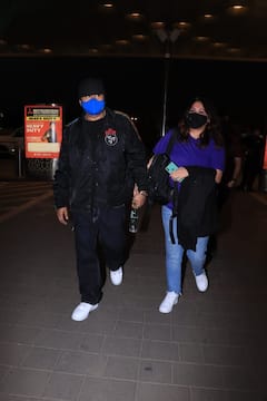 PICS: Honey Singh Walks Hand-In-Hand With Wife At Mumbai Airport