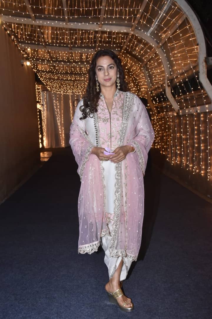 Juhi Chawla made an appearance wearing a baby pink salwar suit as she posed for the camera.