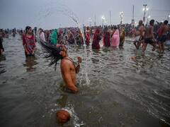 IN PICS|  Mauni Amavasya: Devotees Take Holy Dip in Sangam at Prayagraj  At Magh Mela 2021