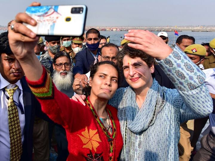 Prayagraj: Congress General Secretary Priyanka Gandhi gets a selfie clicked after taking a holy dip at Sangam, confluence of River Ganga, Yamuna and Saraswati, on Mauni Amavasya during the ongoing annual Magh Mela festival, Thursday, Feb. 11, 2021. (PTI Photo)