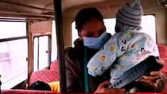 UP: This woman bus conductor performs her duty with 5 month child