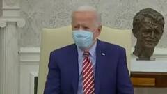 American President Joe Biden pulls up, warns China