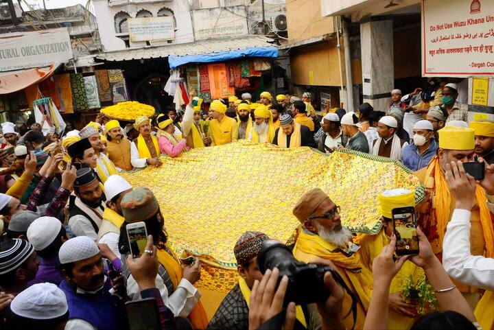 Basant Panchami is being celebrated as an annual festival at Hazrat Nizamuddin and is considered to be a special day for over 700 year. However, this year the event was kept low profile and ended hours earlier keeping in mind the Covid-19 protocols. (Image: PTI)