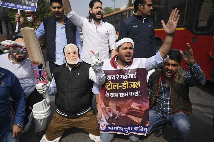 After fuel rates were hiked for the ninth day in a row, price of petrol reached Rs 100 mark for the first time ever in India. According to a price notification of state-owned fuel retailers, petrol and diesel prices were increased by 25 paise per litre each. In Sriganganagar town of Rajasthan, petrol price soared to Rs 100.13 a litre on Wednesday. (Image Courtesy: AFP)