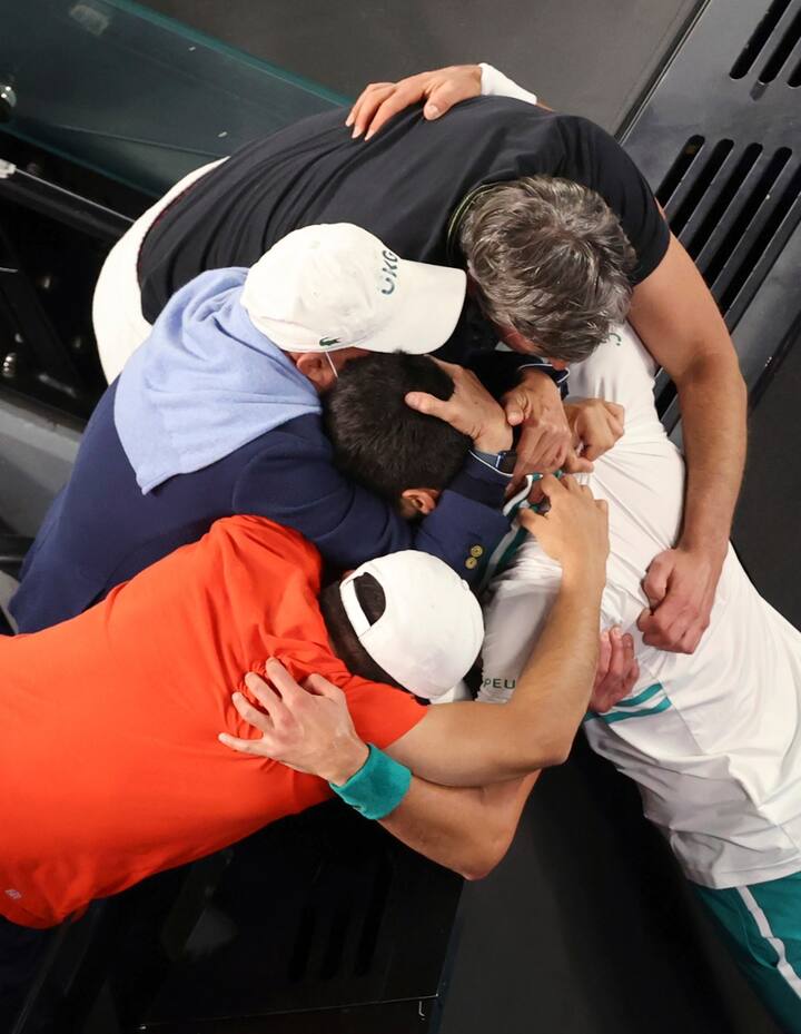 The 33-year old celebrates with his head coach Goran Ivanisevic after winning the grand-slam title. (Image Credits- AP/PTI)
