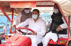 In Pics: RJD Leader Tejashwi Yadav Drives Tractor To Bihar Assembly As Mark Of Protest