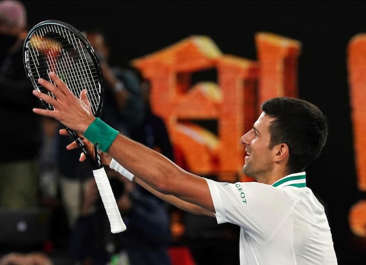 Novak Djokovic looks at his coaching staff after he won his ninth Australian Open title. No one else has won the grand-slam more times than Djokovic.  (Image Credits- AP/PTI)