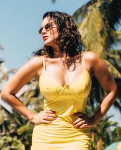 IN PICS | Sunny Leone In Yellow Monokini In Pool Raise Heat Ahead Of Approaching Summers