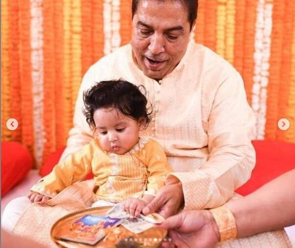 অন্নপ্রাশনের রীতি মতো ইউভানের সামনে রাখা হয় টাকা, গীতা, কলম ও শস্য। টাকা বেছে নেয় ইউভান