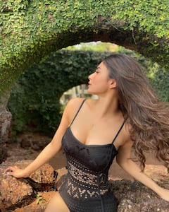 PICS: Mouni Roy Flaunts Her Toned Legs In Black Monokini In Goa, Fans Call 'Naagin' Actress 'Hottie'