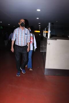 PICS: Rhea Chakraborty Wears Sweatshirt That Says 'Man Up', Gets Spotted With Her Father & Brother At Mumbai Airport