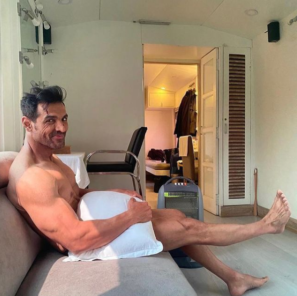 John Abraham Poses Nude In His Latest PIC Posing With Just A Pillow!