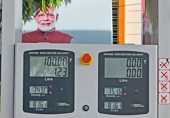 PM Modi's Photo On Petrol Pump Hoardings Violates Model Code: EC After TMC's Objection PM Modi's Photo On Petrol Pump Hoardings Violates Model Code: EC After TMC's Objection