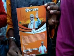 BJP Brigade Rally: মোদির মুখোশ থেকে গোপাল ভাঁড়ের সাজ, ঢোল-তাসা পার্টি-মোদির সমাবেশে রঙিন ব্রিগেড