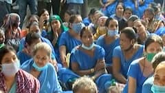 ત્રણ મહિનાનો પગાર ના મળતા સુરતની સિવિલ હોસ્પિટલના કર્મચારીઓએ રોડ પર બેસી કર્યો વિરોધ