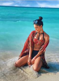 IN PICS: Kasautii Zindagii Kay’s Prerna Aka Erica Fernandes Raises OOMPH In Red & Black Bikini Set While Posing In Maldives