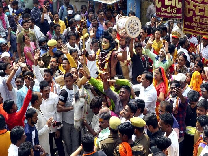 Varanasi: A devotee dressed as Lord Shiva during a procession to mark the Maha Shivratri festival, in Varanasi, Thursday, March 11, 2021. (PTI Photo)