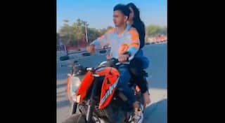 Surat: મેરે જૈસા ઈશ્ક મેં પાગલ.....ચાલુ બાઈકે પાછળ બેઠેલી યુવતીને ખેંચીને ખોળામાં લઈ કિસ કરનાર યુવક કોણ ? યુવતી કોણ છે    ?