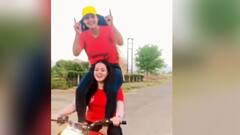 Video of 2 girls doing life-threatening stunts on road goes viral | Ghaziabad