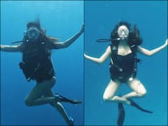 PICS: Esha Gupta Turns Into 'Dory' As She Frolics In Water During Maldives Vacation
