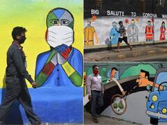 In Pics: भिंतींवर चित्र काढत कलाकारांनी केली जनजागृती