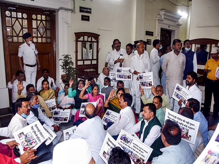 RJD legislators stage a dharna outside Speaker Vijay Kumar Singhs chamber during Budget Session of Bihar assembly, in Patna, Tuesday, March 23, 2021. (PTI Photo)