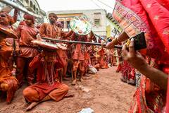 IN PICS | Men, Women Celebrate Lathmar Holi With Frevour In Mathura