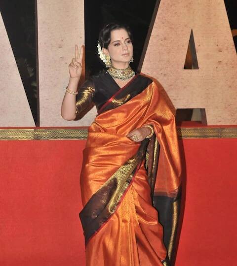 चित्रपटाचा ट्रेलर प्रदर्शित झाला तेव्हा कंगना केशरी रंगाच्या साडीत दिसून आली होती.