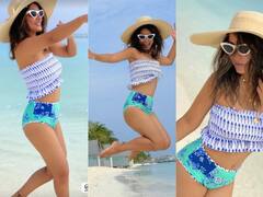 IN PICS: Hina Khan Frolicking On The Beach In A Floral Bikini Set Will Take Away Your Mid-Week Blues!