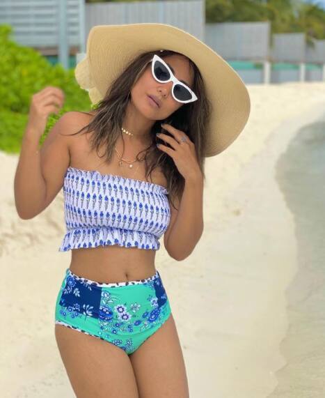 Hina can be seen dressed in floral print aqua coloured bikini set. [pic credit: Instagram/Hina Khan]