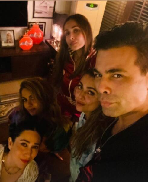 Karan also posted a group photo posing with Karisma, Natasha, Malaika, and Amrita with a caption “Catchin up.” [pic credit: Instagram/ Karan Johar]