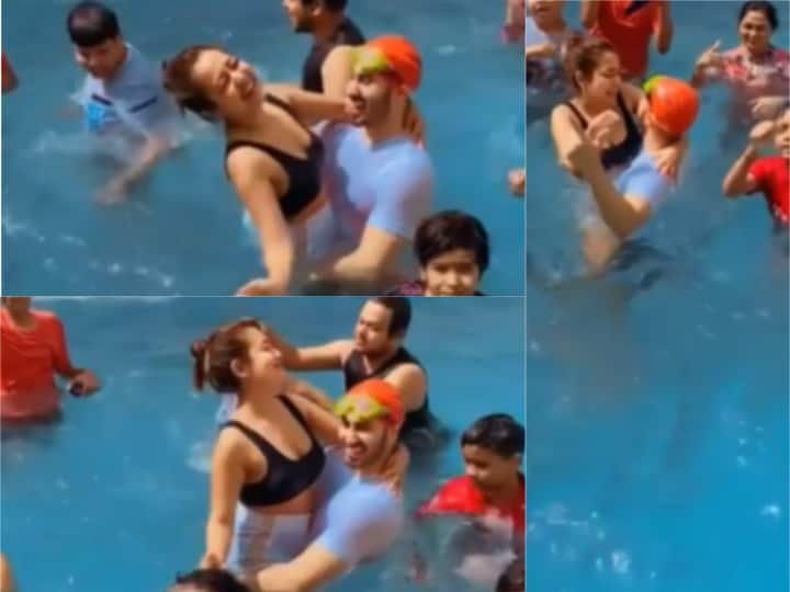 Neha Kakkar-Rohanpreet Singh Kickstart Holi Celebrations With Pool Party! Watch: Neha Kakkar Adorably Dances On Hubby Rohanpreet Singh’s Lap As The Couple Kickstart Holi Celebrations With Pool Party!