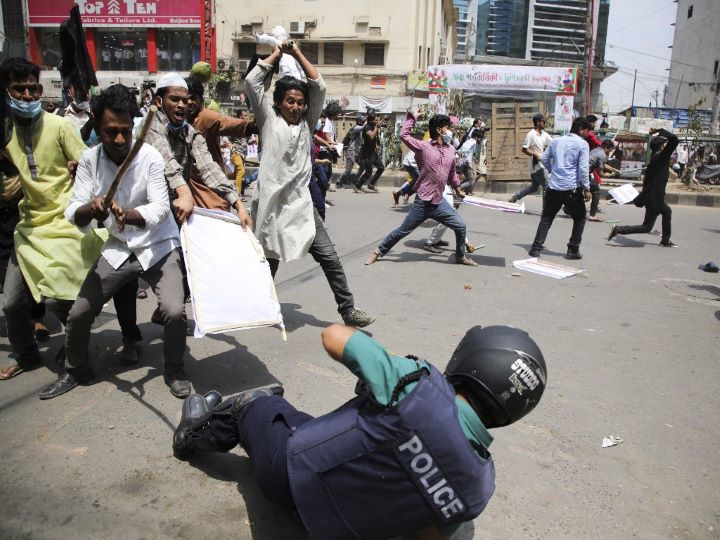Activists from a student council clash with police during a demonstration to protest against PM Narendra Modi, in Dhaka on March 25, 2021. AFP