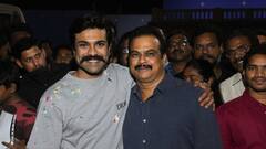 PICS: SS Rajamouli Feeds Cake To Ram Charan On His Birthday On Sets Of 'RRR'