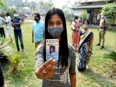 IN PICS | Voters In West Bengal & Assam Queue Up To Exercise Their Franchise Amid Tense Political Atmosphere