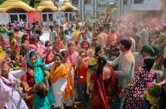 IN PICS | People Across India Perform 'Holika Dahan' Amid COVID-19 Restrictions