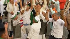 Farmers dance on the beats of Dholak to celebrate Holi at Ghazipur border