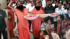 Holi Celebration 2021: Baba Ramdev celebrates with flowers in Haridwar