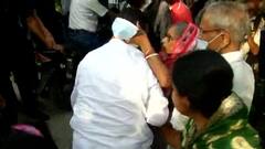 Suvendu Adhikari seeks blessings from an elderly couple after casting vote