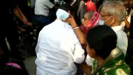 Suvendu Adhikari seeks blessings from an elderly couple after casting vote