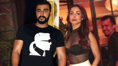 मलायकानं शेअर केलेल्या या फोटोमध्ये ती किचनमध्ये जेवण बनवताना दिसत आहे.