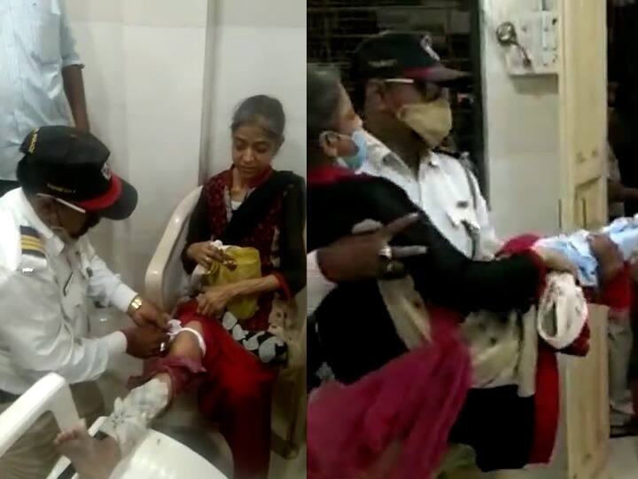 Kalyan Ulhasnagar traffic police gave first aid to the injured woman and showed humanity खाकीतली माणुसकी... वाहतूक पोलिसाने अपघातग्रस्त महिलेवर प्रथमोपचार करत घडवले माणुसकीचे दर्शन