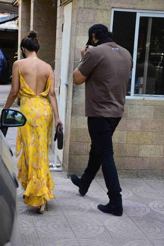 Malaika Arora Rocks Yellow Backless Dress As She Poses With Sister