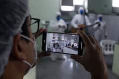 IN PICS: World Celebrates Second Easter Under Covid Restrictions; Hospital In Brazil Pray With Patients